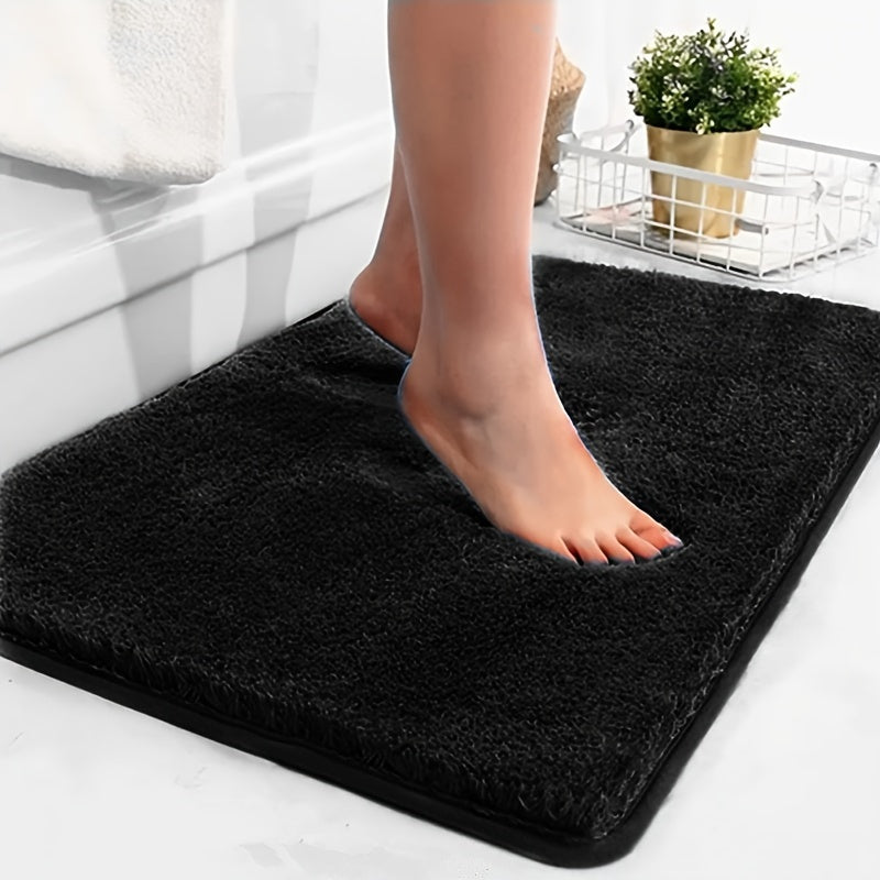 Sterk absorberende badmat, sneldrogend en comfortabel gevoerd. Voorkomt natte vloeren in badkamer.