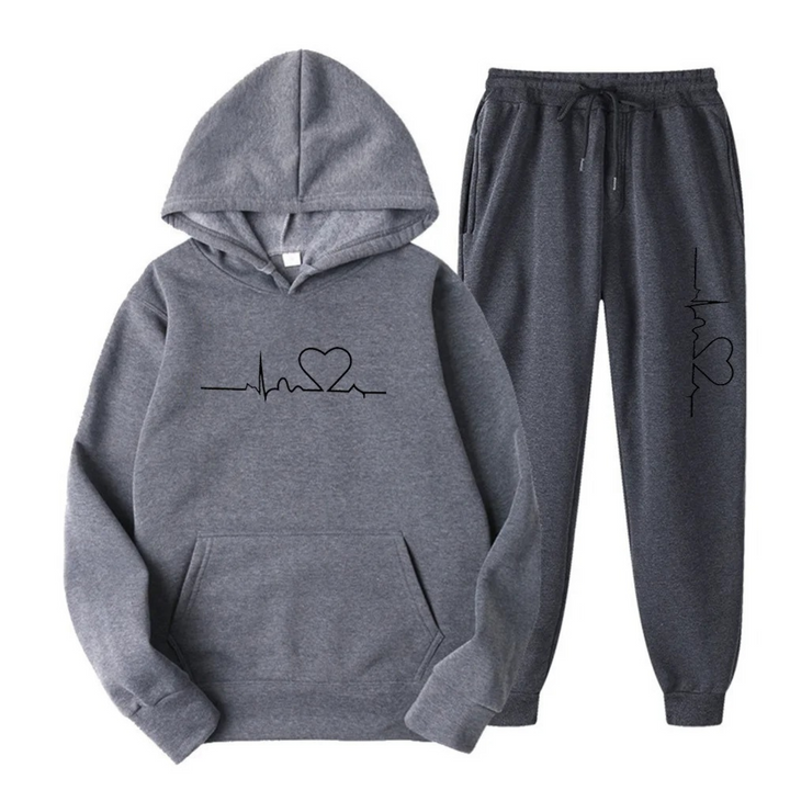 LyraSet dames trainingspak, een gemakkelijk en modieus joggingpak met capuchon.