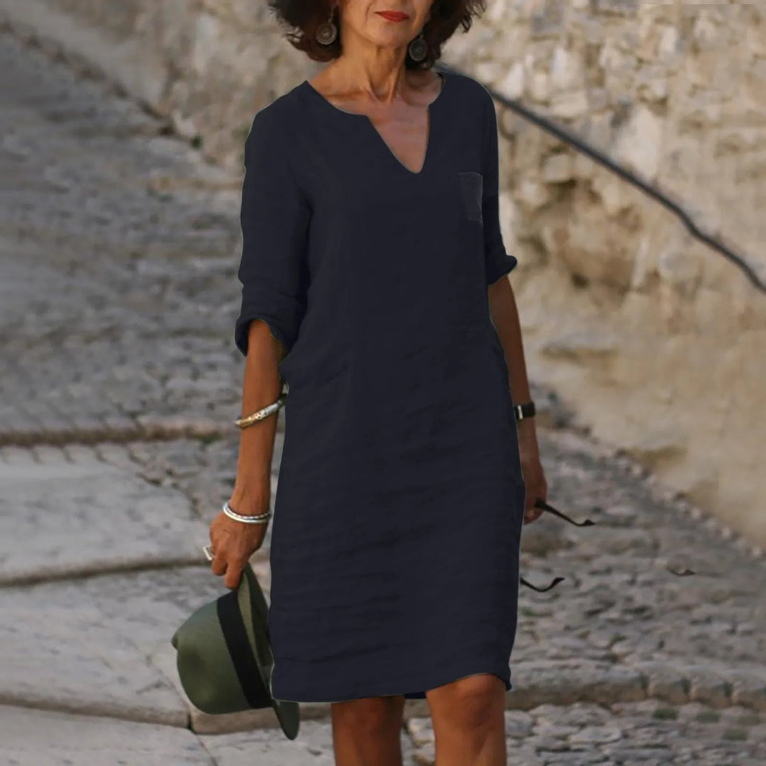 Zomerse damesjurk: elegante midi lengte. Perfect voor een stijlvolle uitstraling en optimaal comfort.