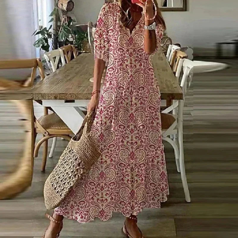 Comfortabele dames zomerjurk, luchtig en losvallend, met prachtige bloemenprint in boho stijl.