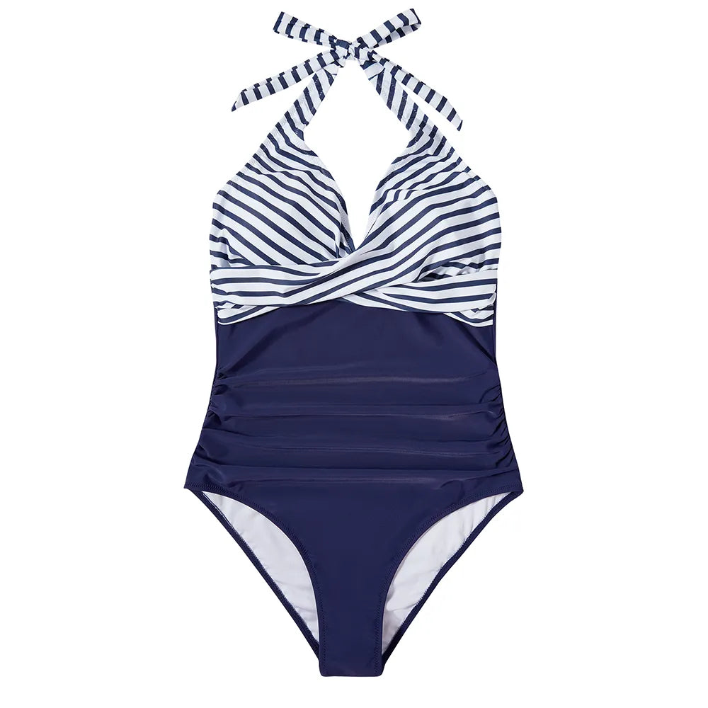 Modieus push-up badpak voor dames, met open rug en moderne bandage accenten.