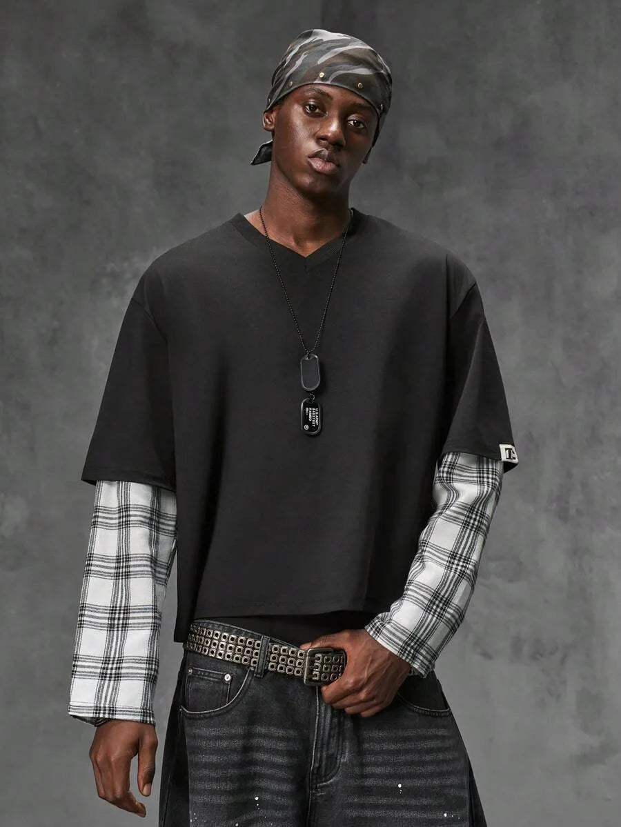 Stijlvol heren t-shirt met unieke plaid patchwork mouwen. Ideaal voor streetwear outfits.