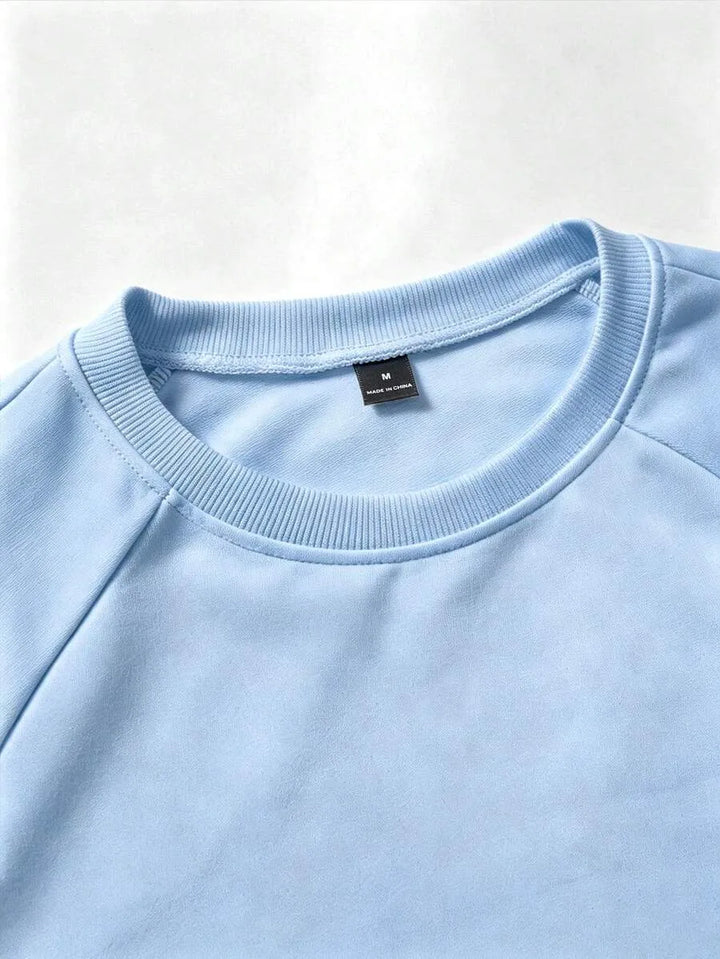 Dagelijkse heren longsleeve met stijlvolle handgeschreven print. Ronde hals, comfortabel en veelzijdig.
