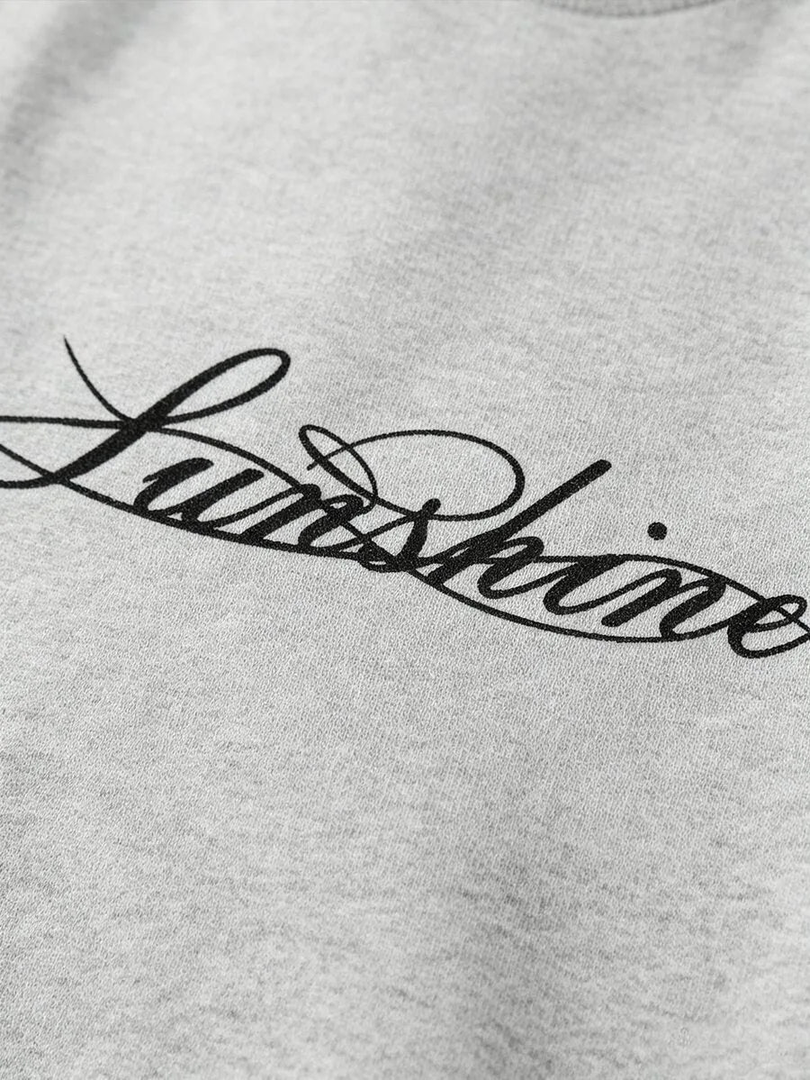 Casual heren longsleeve met handgeschreven print en ronde hals. Geschikt voor dagelijks draagcomfort.