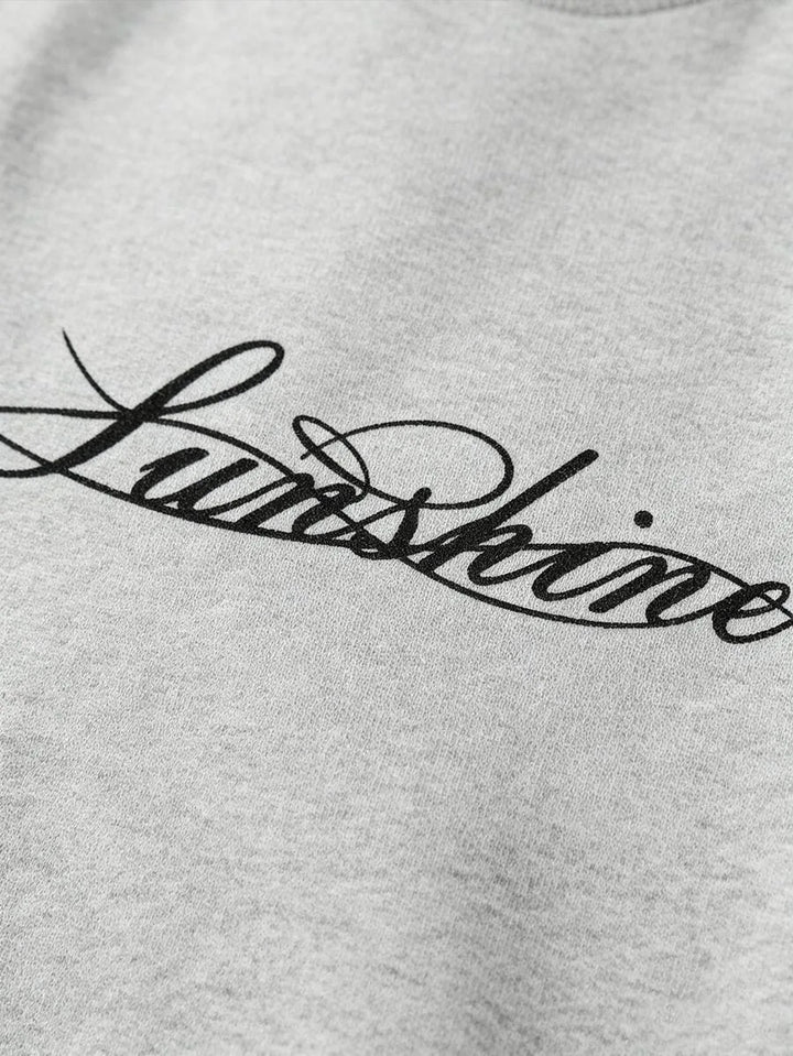 Casual heren longsleeve met handgeschreven print en ronde hals. Geschikt voor dagelijks draagcomfort.