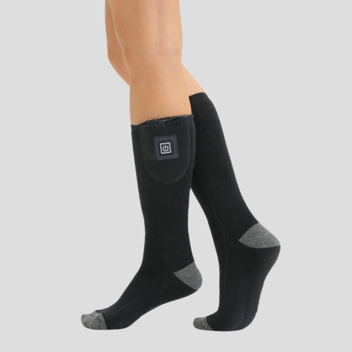 Warme unisex elektrische sokken voor optimale winter comfort tijdens wintersport of buitenactiviteiten, met instelbare warmte.