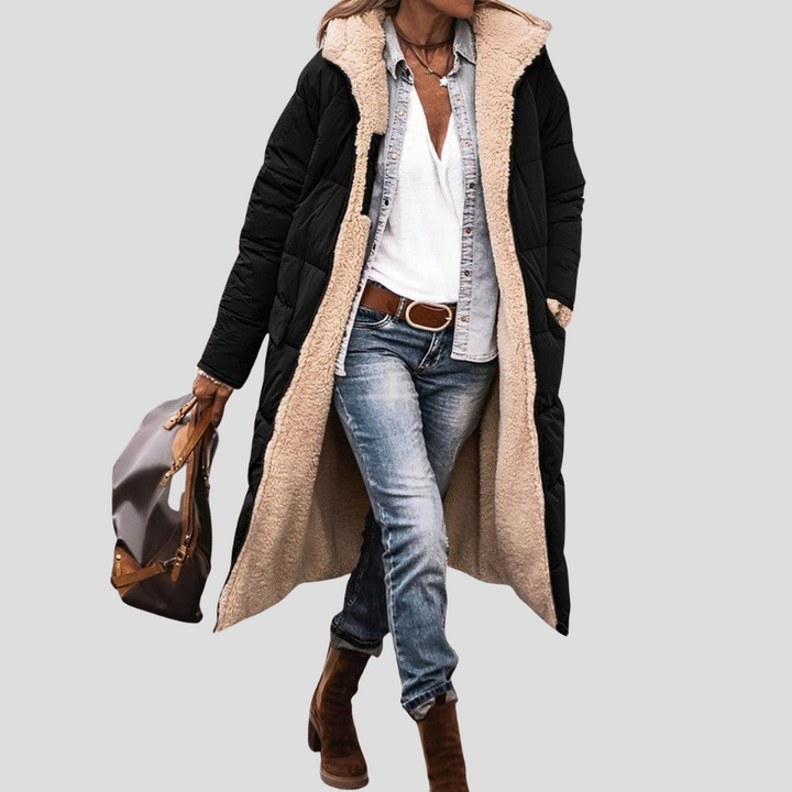 Dames lange omkeerbare winterjas met warme teddy voering en capuchon. Ideaal voor de winter.