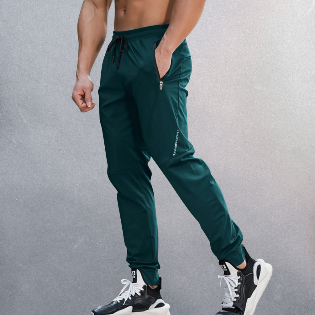 Ademende heren sportbroek, comfortabel en lichtgewicht voor training, reizen en casual lente activiteiten.