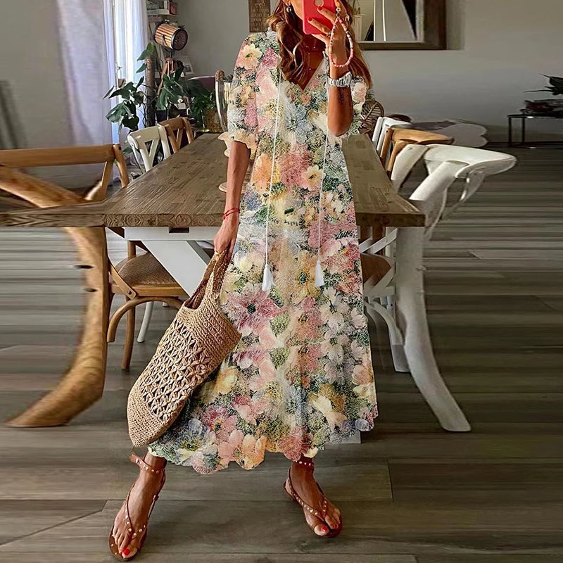 Dames luchtige maxi jurk met bloemenprint, perfect als zomerjurk of strandjurk, comfortabel en stijlvol.