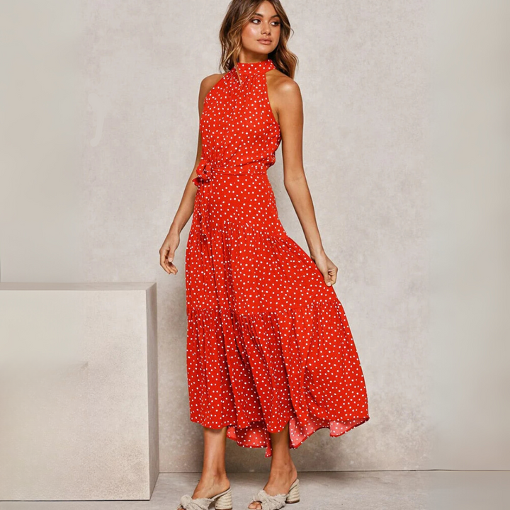 Stijlvolle dames midi-jurk met stippenprint, A-lijn model, perfect als vakantie-, strand- of zomerjurk.