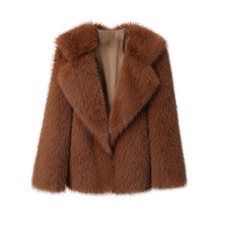 Pluizige dames winterjas met losse pasvorm, comfortabel en warm, een echte fashion statement.