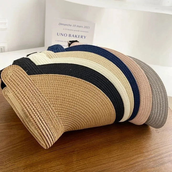 Modieuze verstelbare strohoed voor dames, een essentieel zomeraccessoire voor elke outfit.
