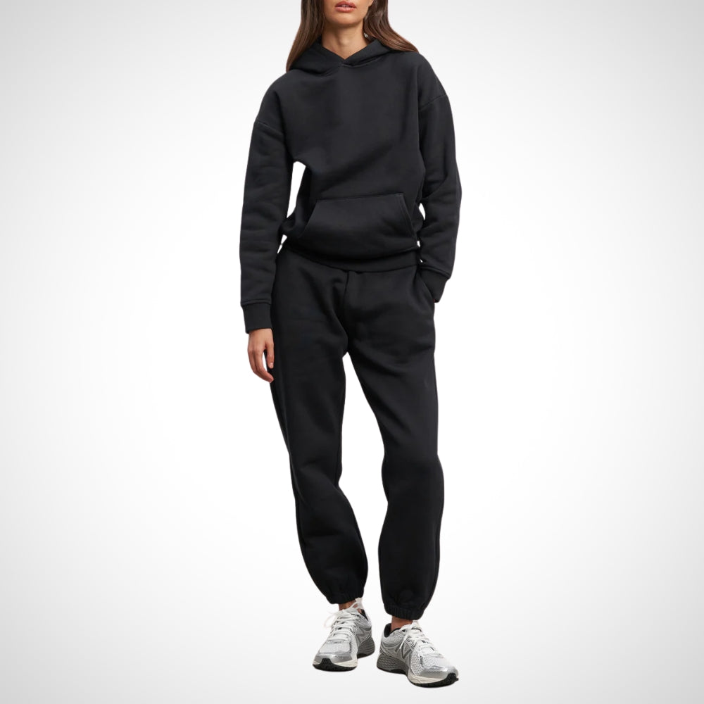 Complete dames joggingpak set met comfortabele hoodie en bijpassende broek. Perfect voor een relaxte of actieve dag.