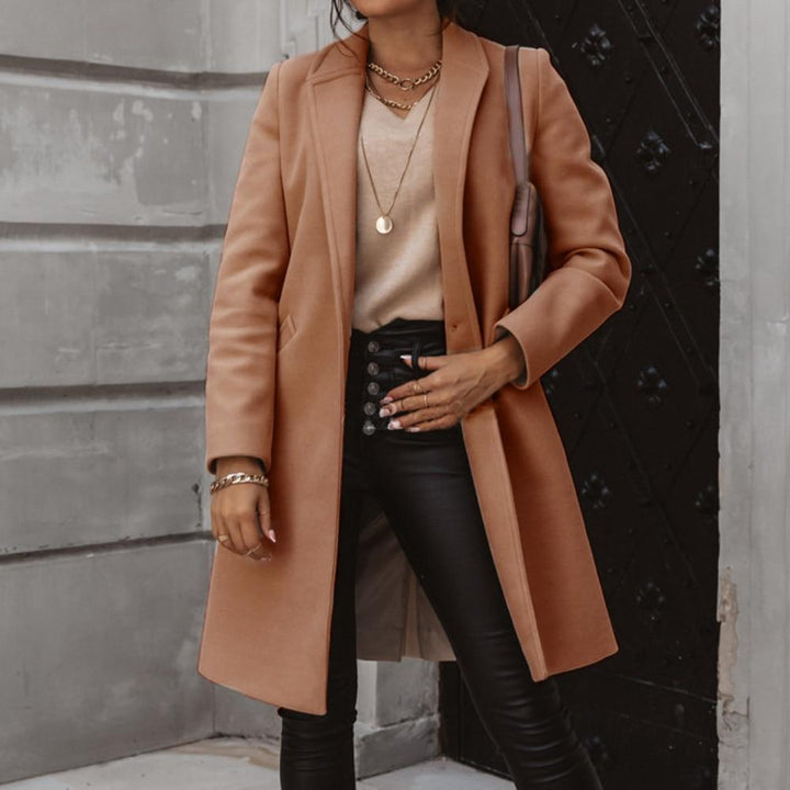 Dames lange kasjmier jas: elegantie en warmte voor de winter. Comfortabele winterbovenkleding voor dames.