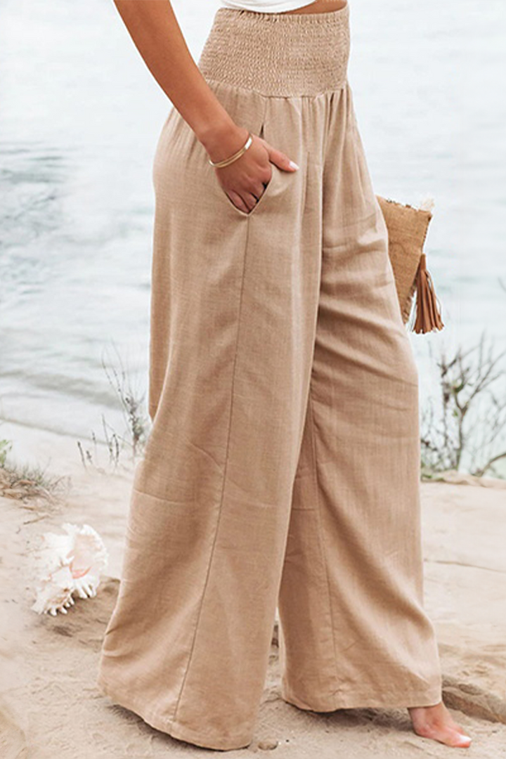 Comfortabele dames palazzo broek, perfect voor lente en zomer, met elegante wijde pijpen.
