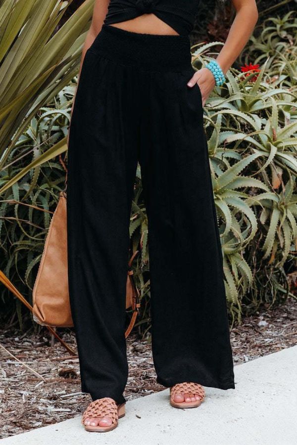 Trendy dames palazzo broek, hoge taille en wijde pijpen, ideaal voor een elegante lentelook.