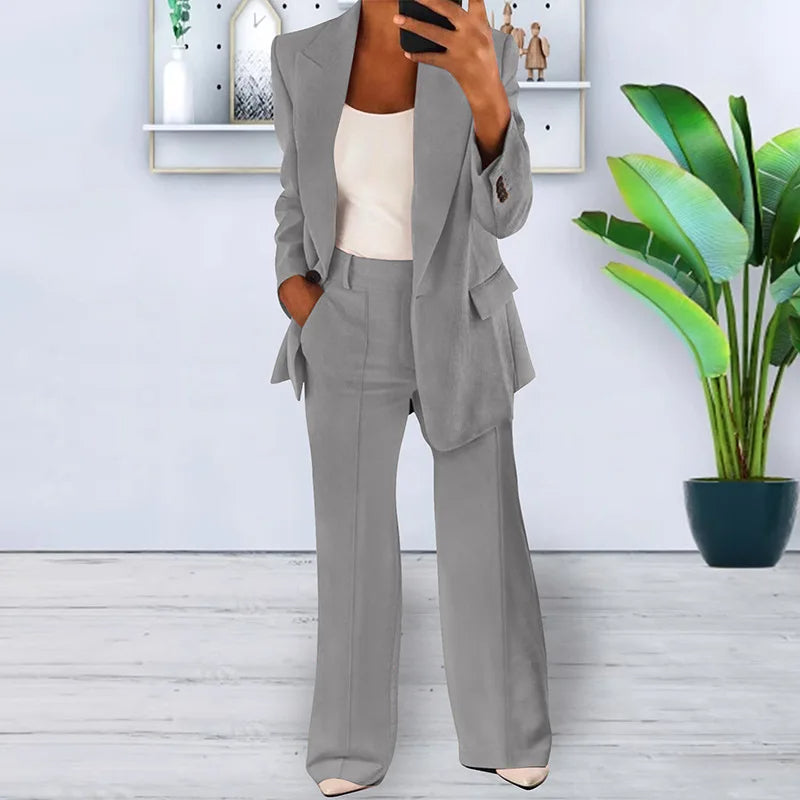 Stijlvol damesbroekpak met wijde pijpen, comfortabele zakelijke kleding voor een elegante look.