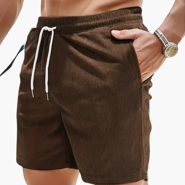 Moderne herenkleding: zomer shorts met relaxte pasvorm, essentieel voor een comfortabele en casual uitstraling.