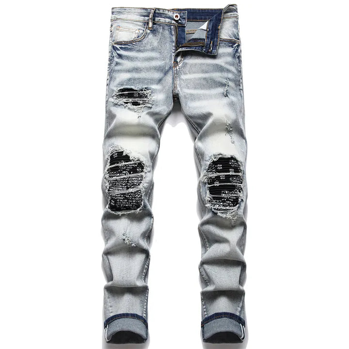 Jaxon herenjeans: trendy gescheurde broek met unieke details. Comfortabel, modieus en perfect voor een eigentijdse look.