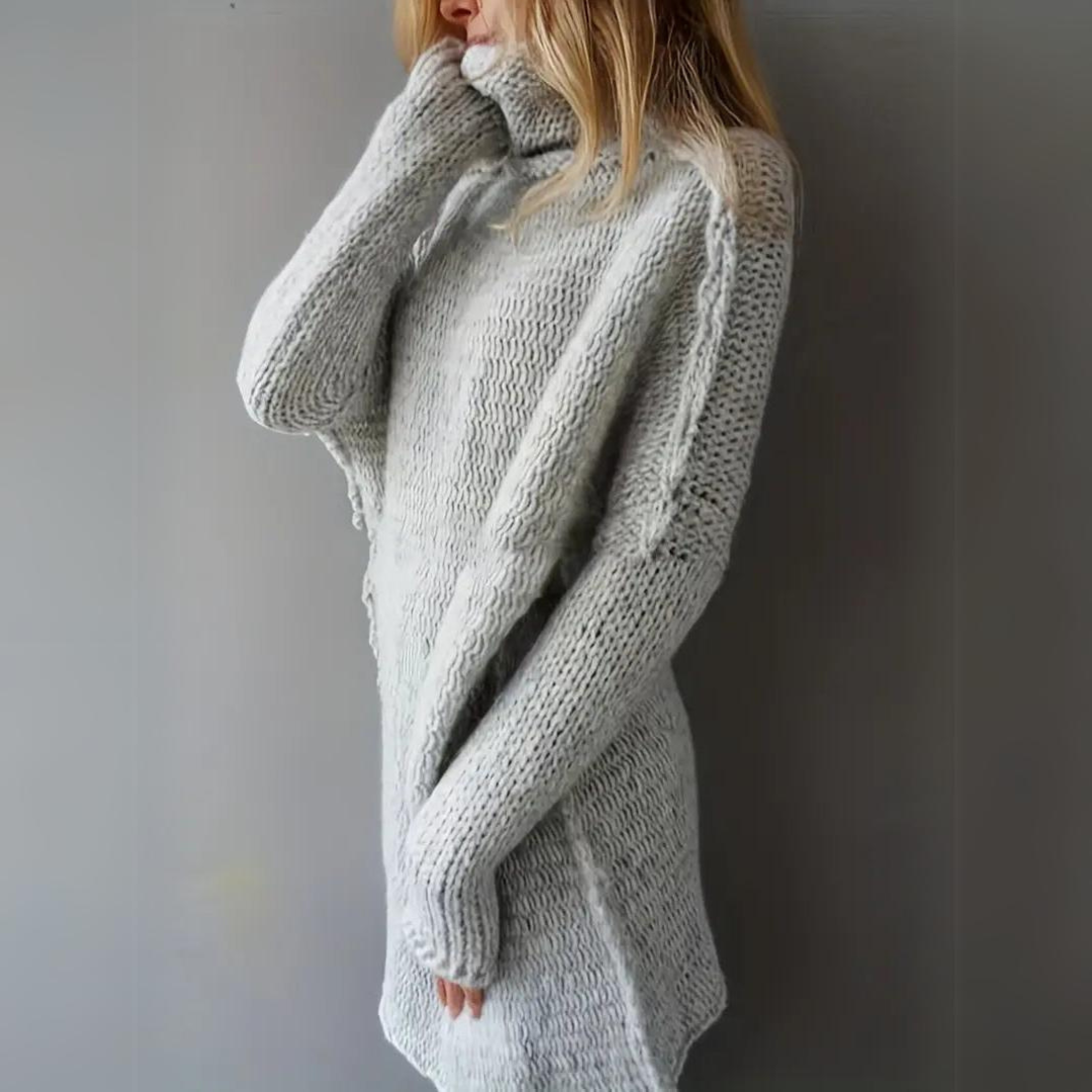 Modieuze dames winter trui: lange, gebreide coltrui met losvallende pasvorm voor ultiem comfort en stijl.