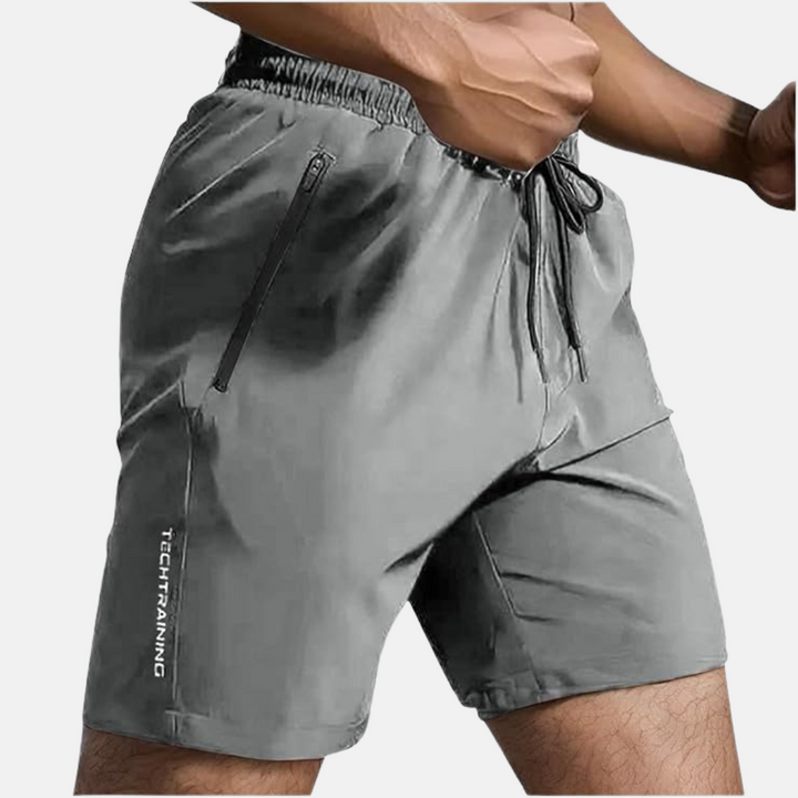 Stijlvolle heren sneldrogende shorts, geschikt voor workout, hardlopen en ontspannen zomerdagen. Ademend.