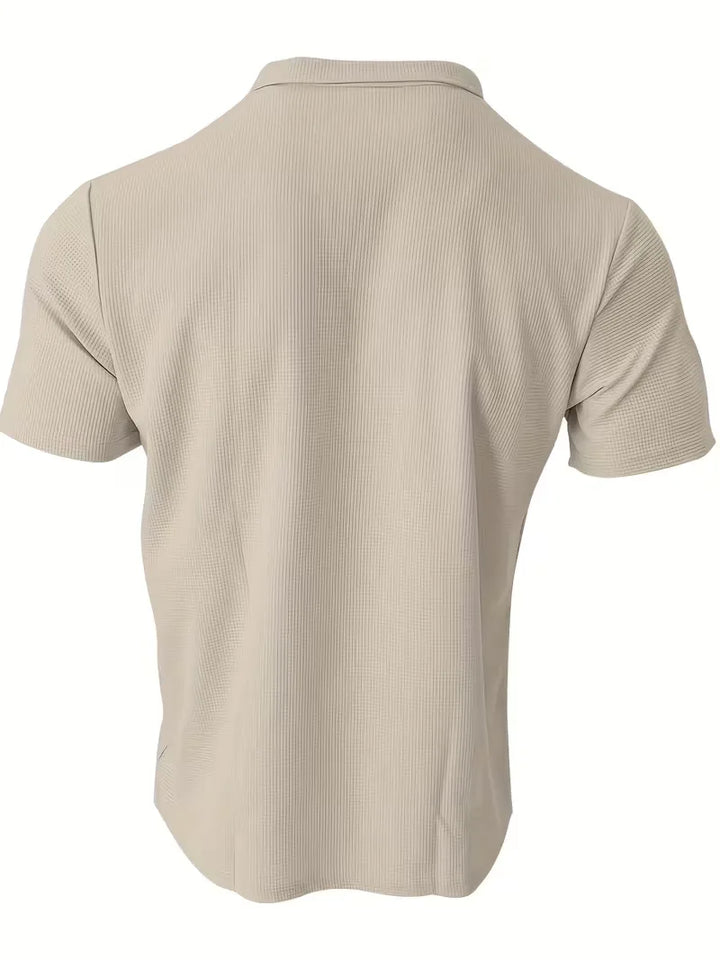 Comfortabele regular fit herenpolo, V-hals, korte mouw, wafelstructuur, voor elke dag.