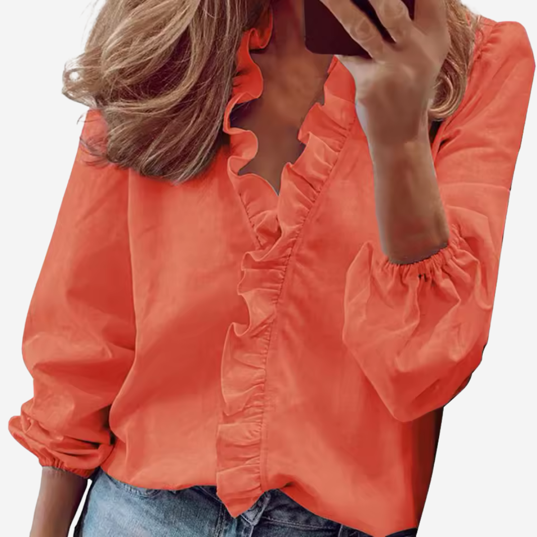 Veelzijdige dames tuniek blouse met V-hals, ruches en comfortabele, losvallende pasvorm.