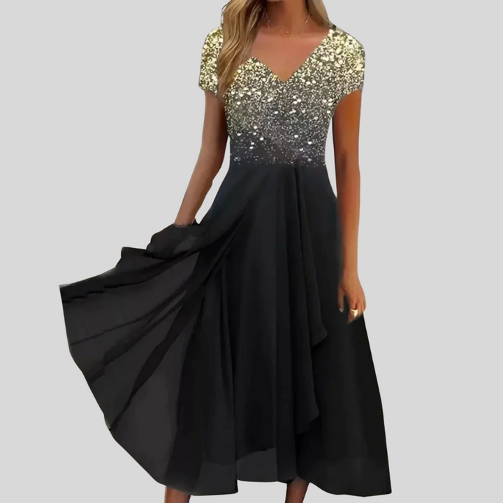 Moderne damesjurk met veelzijdige print. Ideaal als chique avondjurk of elegante kleding voor speciale momenten.