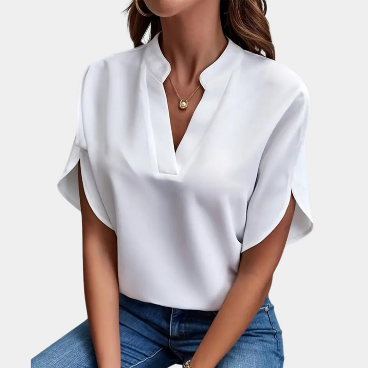 Trendy dames V-hals top met korte mouwen. Een veelzijdige casual lente/zomerblouse, comfortabel en elegant.