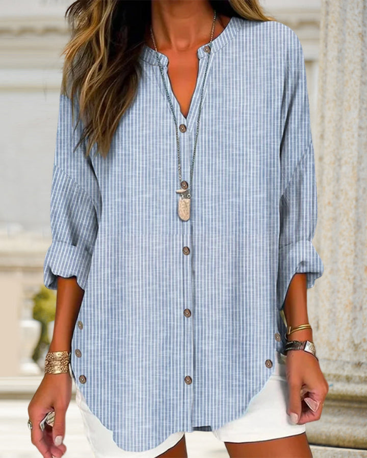 Stijlvolle dames gestreepte top met comfortabele pasvorm, perfect voor een casual-chique lente/zomer outfit.