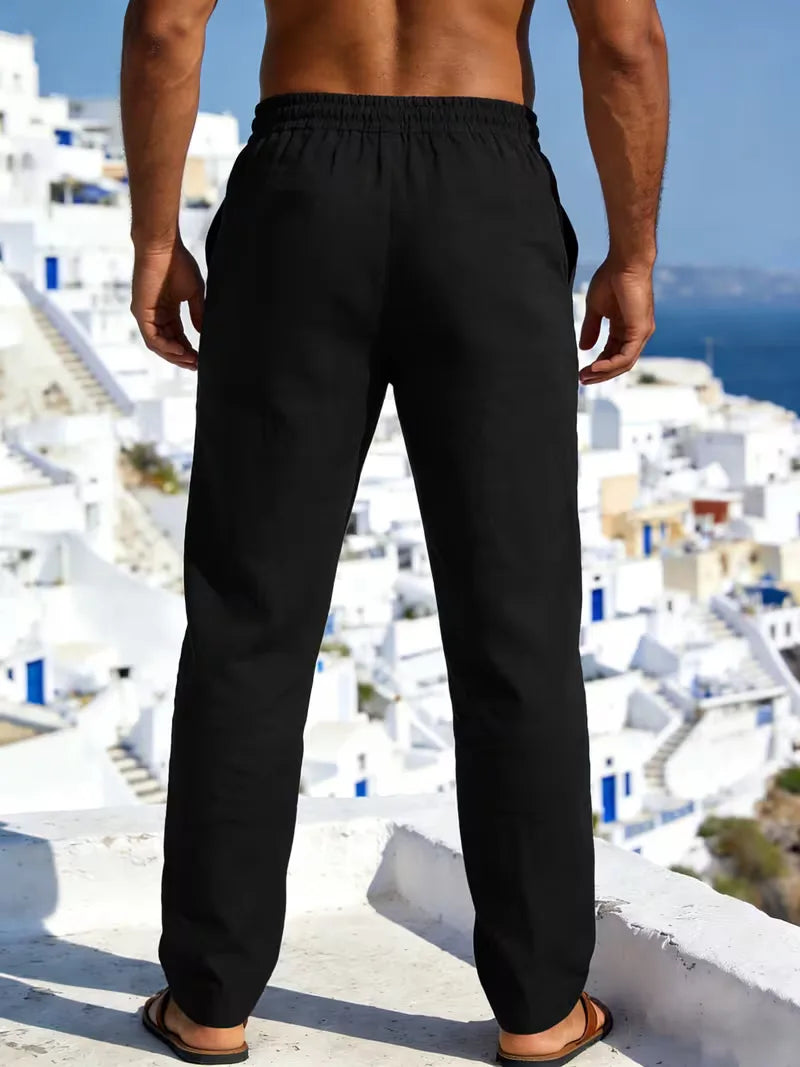 Heren chino van linnen in marineblauw met elastische tailleband en rechte pijpen.