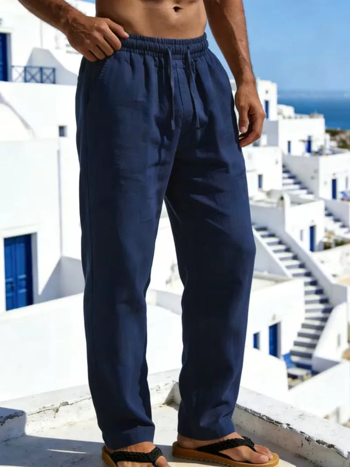 Zwarte linnen herenbroek met elastische tailleband. Comfortabele rechte pijp voor elke zomerse gelegenheid.