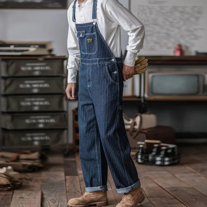 Comfortabele damesoverall in indigo denim met verstelbare banden en een tijdloze stijl.