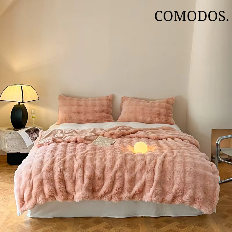 Stijlvolle CloudCozy deken van imitatiebont, zacht en warm; ideaal als luxe plaid voor je bank of bed.