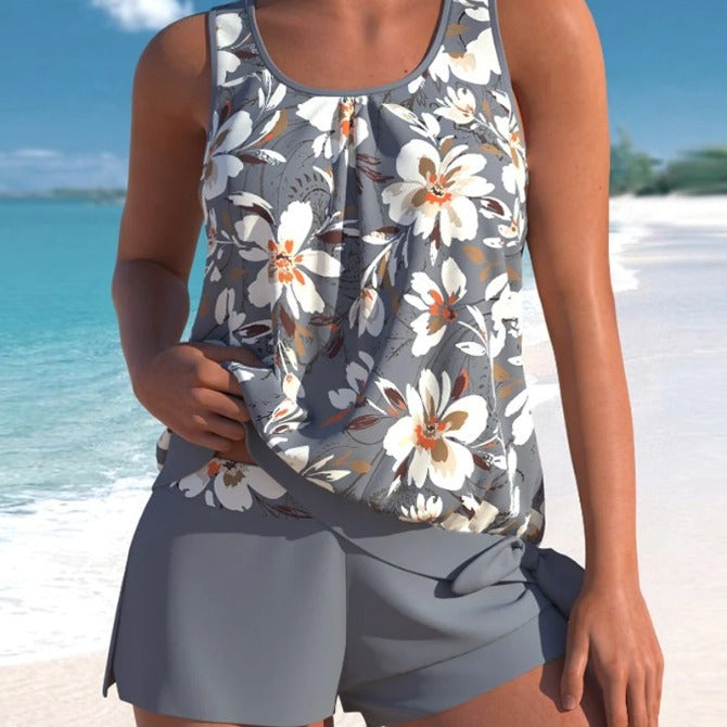 Dames badpak CJ26 tweedelig met trendy print en comfortabele zwemshort. Ideaal voor zomer en strand.