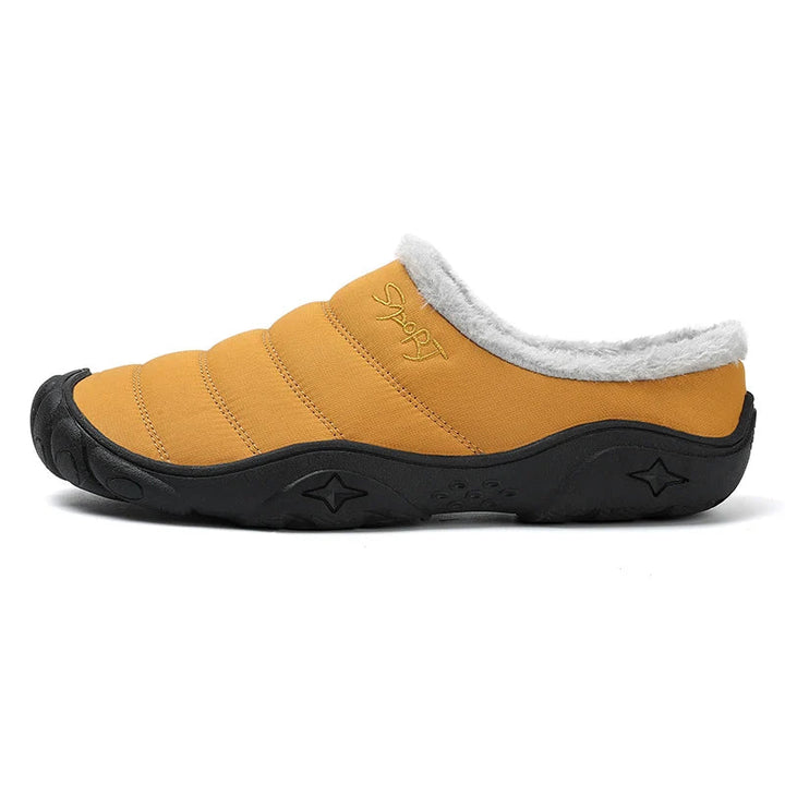 Heren warme sloffen met zachte voering. Comfortabele instappers voor ontspannen momenten.