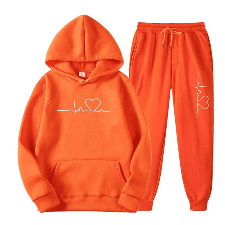 Comfortabel dames trainingspak met capuchon in zachte stof, perfect voor een modieuze look.