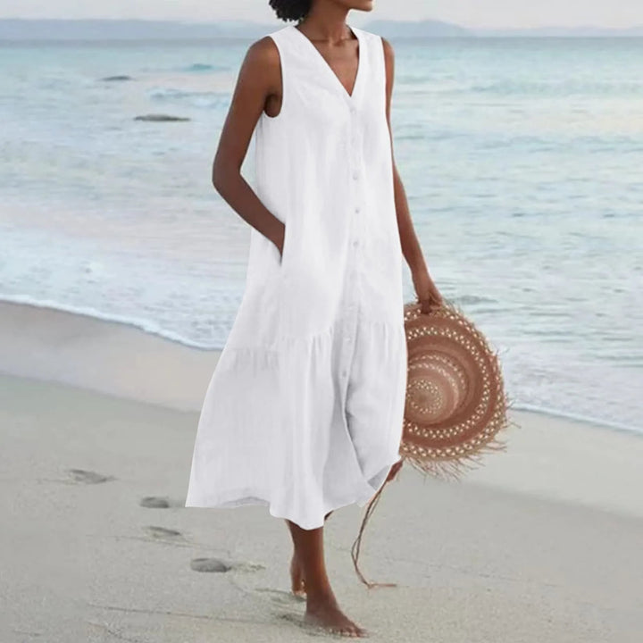 Elara linnen dames zomerjurk met V-hals, losvallend en elegant. Perfect voor strand of casual lente look.