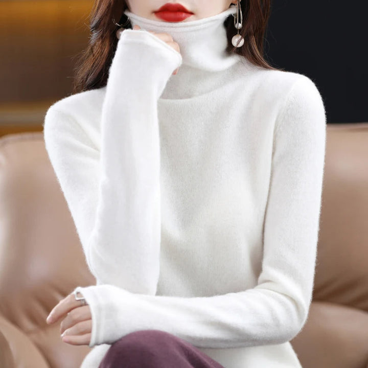 Modieuze kasjmier dames trui met lange mouwen, biedt comfort en warmte als winterkleding.