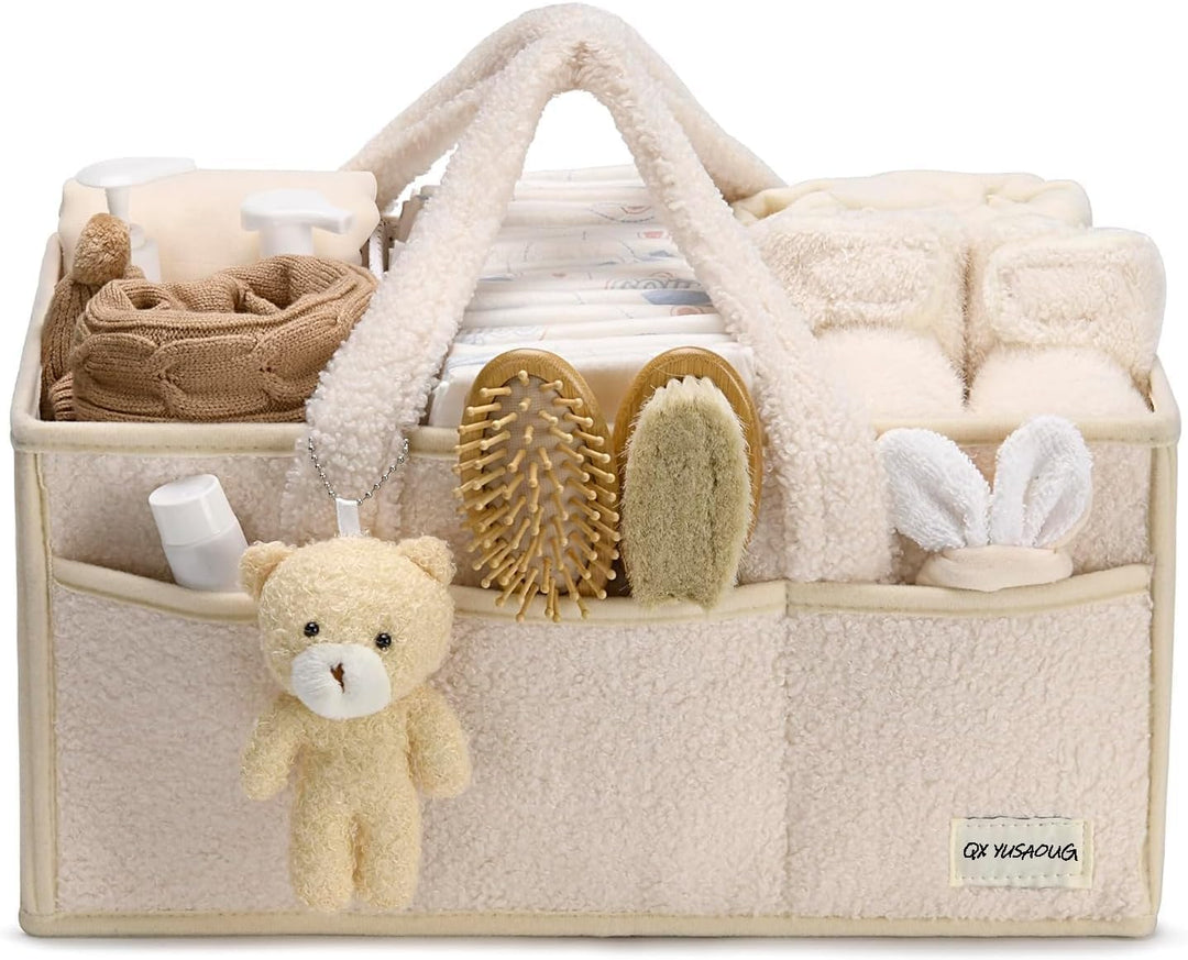 Ideaal kraamcadeau: een sherpa luiertas caddy in wit, roze, beige of groen.