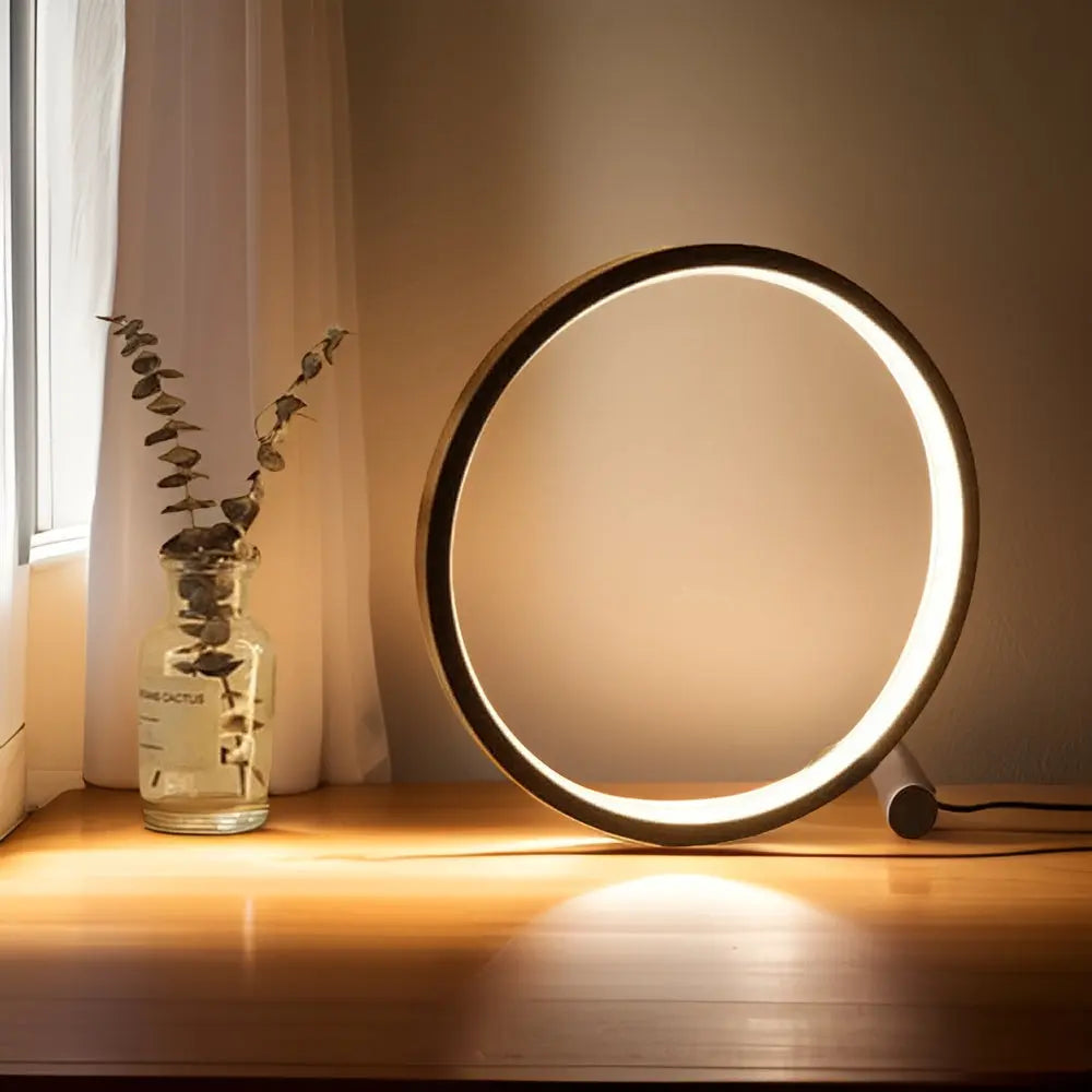 Ronde LED tafellamp, dimbaar voor perfecte sfeerverlichting in elke moderne kamer.