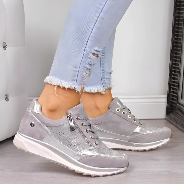 Blauwe dames orthopedische sneakers met ondersteuning, ideaal tegen voetvermoeidheid voor actieve levensstijl.