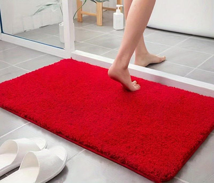 Luxe polyester badmat, zacht en absorberend. Ideaal als badkamerdecoratie en comfortabel onder de voeten.
