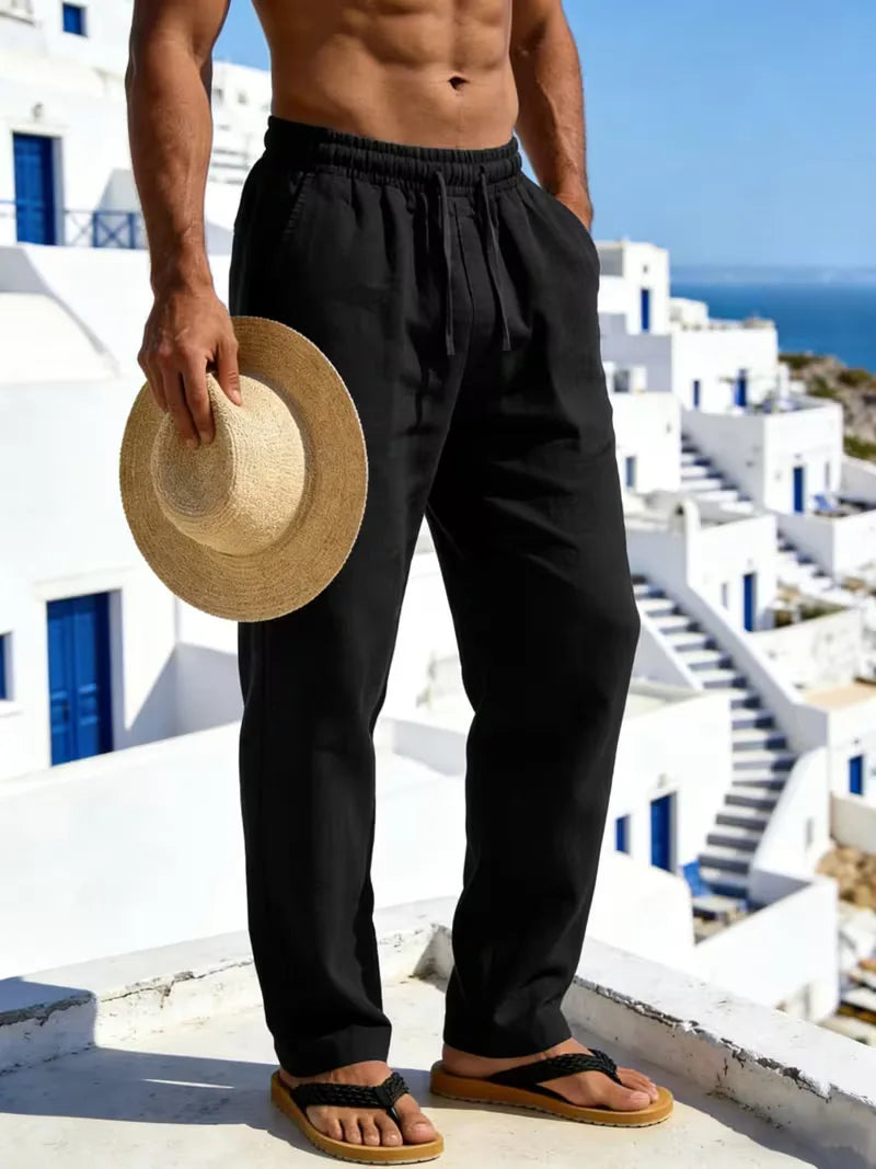 Zwarte heren linnen broek, rechte pijp, elastische tailleband. Stijlvolle casual herenmode.