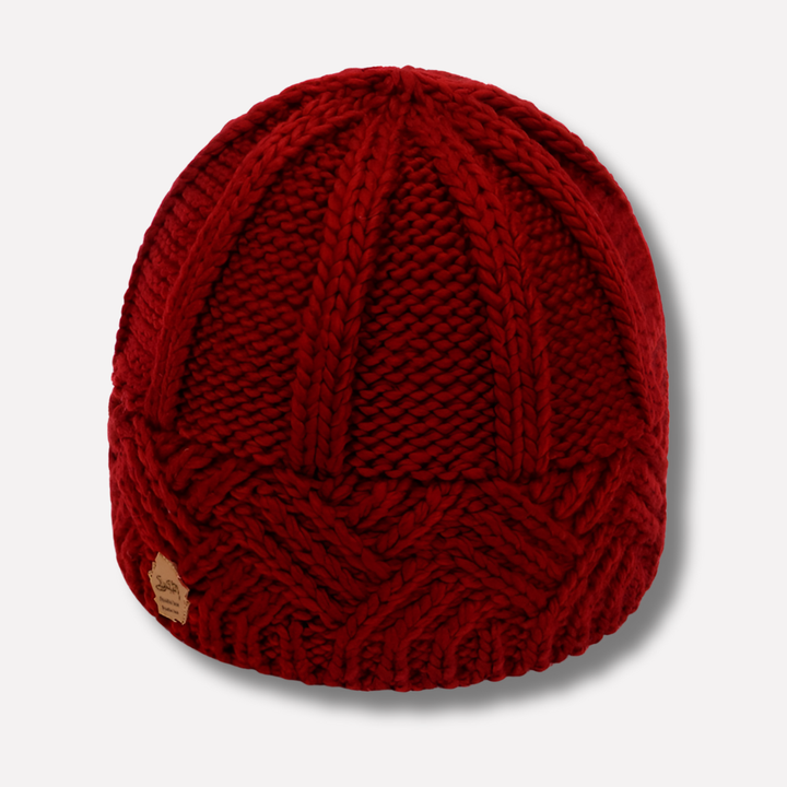 Zachte gebreide damesmuts met trendy omslag. Comfortabele wintermuts van acryl.
