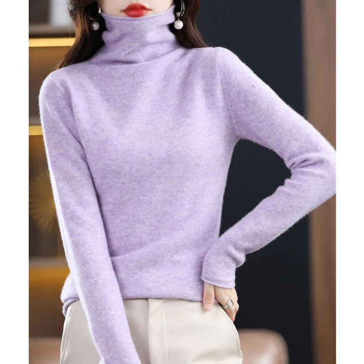 Gebreide effen kasjmier dames trui, stijlvol en warm, een essentieel kledingstuk voor de winter.