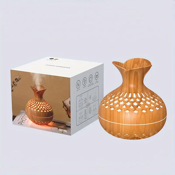 AromaBloom diffuser met zacht sfeerlicht, essentieel voor een moment van pure ontspanning en aromatherapie.