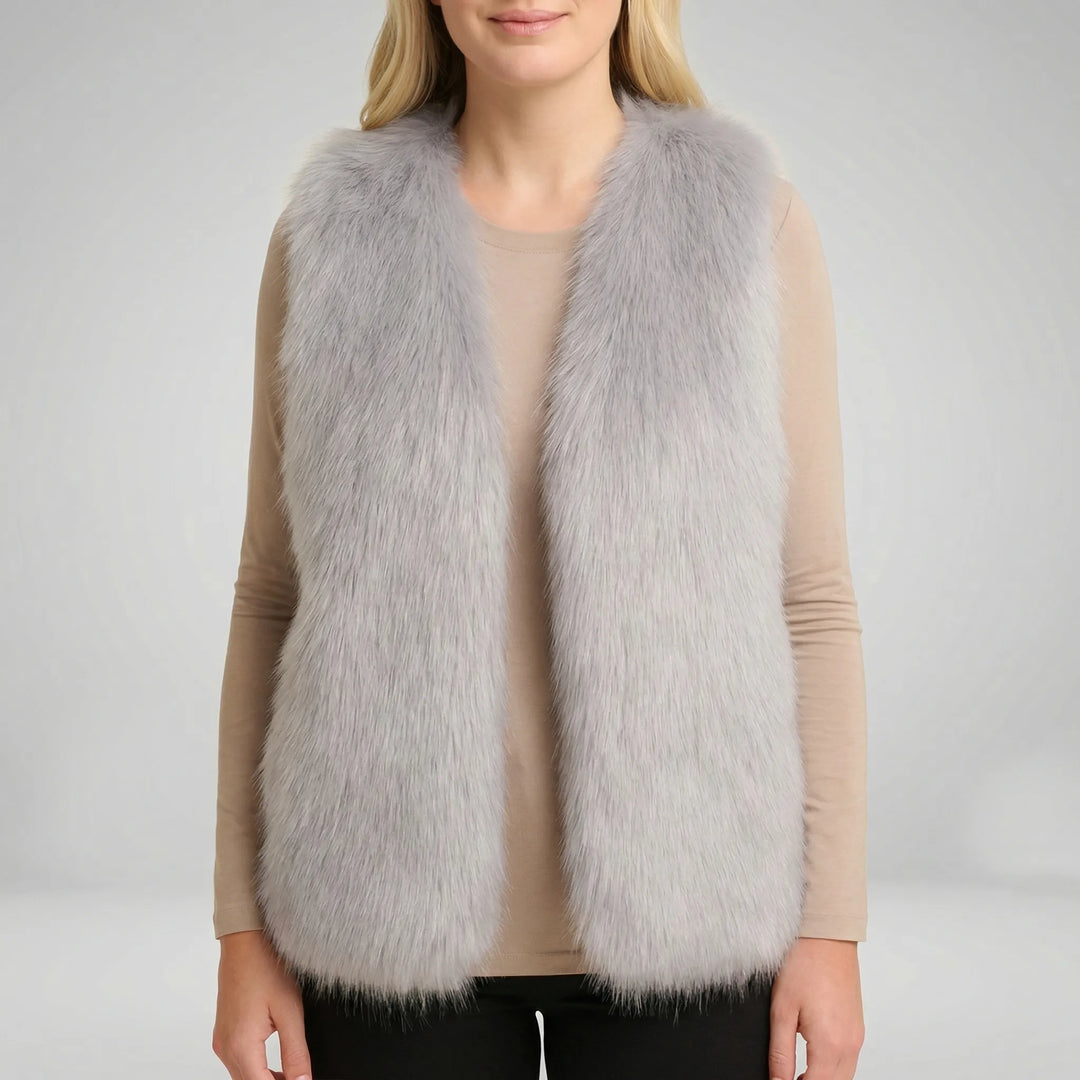 Warm en comfortabel bontlook dames gilet, een mouwloze bodywarmer ideaal voor koude dagen in de herfst/winter.
