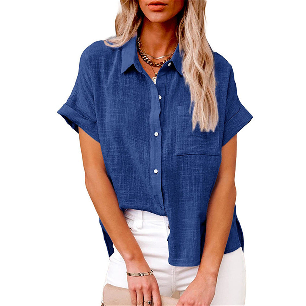 Effen damesblouse met korte mouwen en stijlvolle knoopsluiting, perfect voor elke gelegenheid.