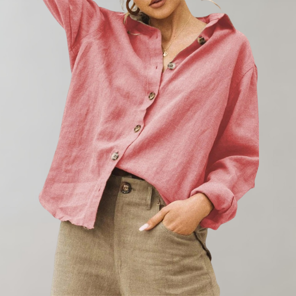 Elegante losvallende Hoymans damesblouse met vintagestijl en knoopsluiting, ideaal voor modebewuste vrouwen.